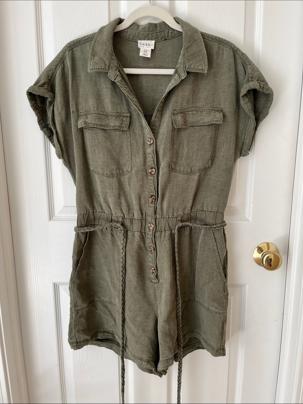 Linen blend romper with pockets and tie. New without tags.